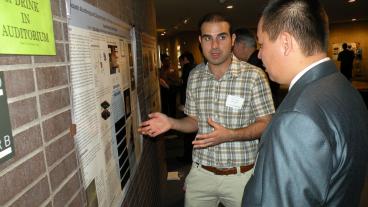 A student presents research at the 2012 Conference of Earth Energy Research