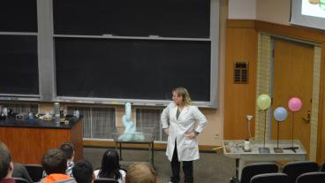 Chemistry and geochemistry professor Renee Falconer performs a chemistry show in Coolbaugh Hall.