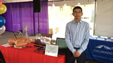 Mechanical engineering graduate student Songpo Li presented his research, “Gaze-Driven Automated Robotic Laparoscope System," at the Colorado Innovation Faire Sept. 12. (Photo Credit: Xiaoli Zhang)