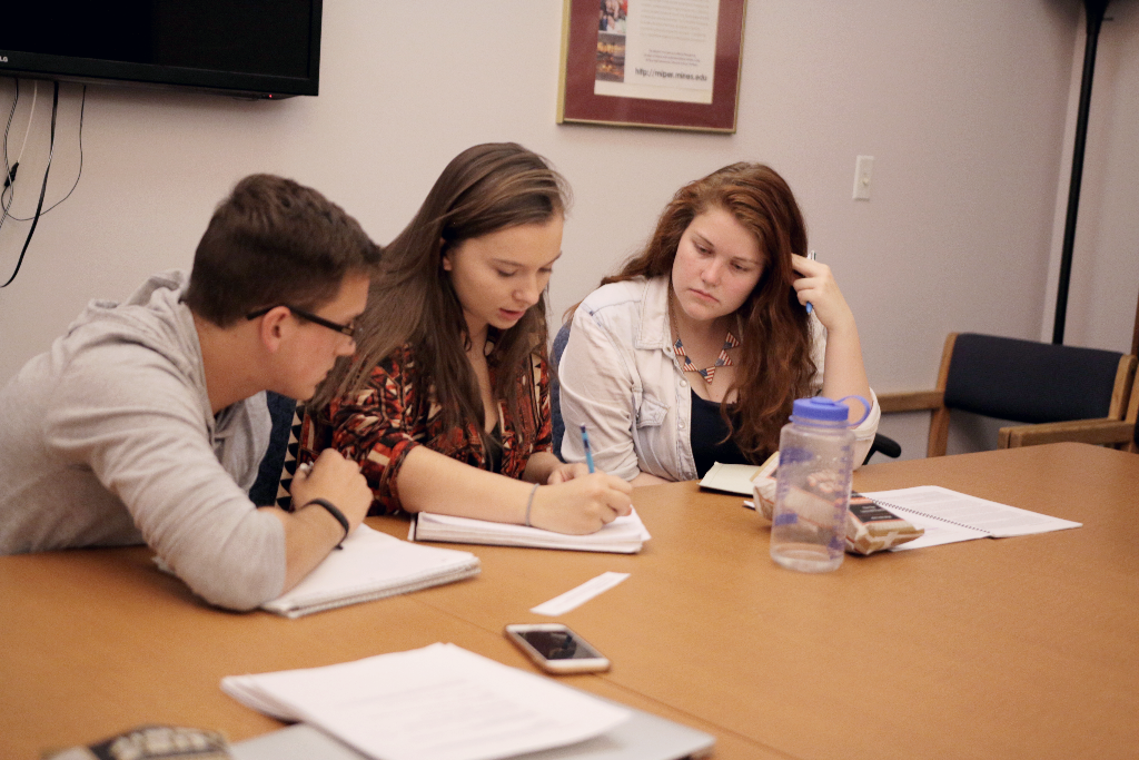 The team forms an argument during an evening practice leading up to the regional competition.