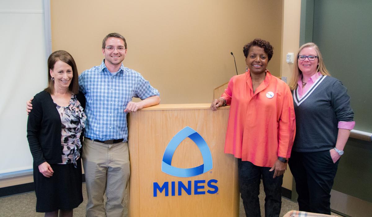 The organizers of the event with the speaker. Left to right: Deb Lasich, Associate Vice President for Diversity and Inclusion at Mines; Petere Weddle, President of oSTEM at Mines; Faye Tate, Director of Global Diversity, Equality, and Inclusion for CH2M; and Kim Pattillo, CH2M University Relations. 