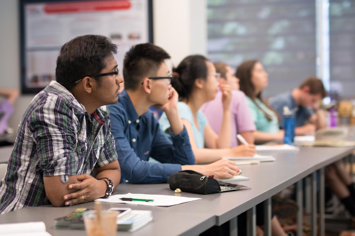 Students listen during the data analysis externship