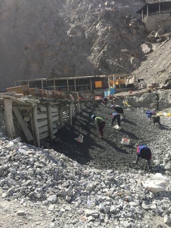 Workers at a small mine in Secocha, Peru pick through waste rock as they look for ore-rich pieces. Photo by Paul Santi Workers at a small mine in Secocha, Peru pick through waste rock as they look for ore-rich pieces. Photo by Paul Santi