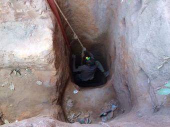 A young cobalt miner in Kolwezi, Democratic Republic of the Congo, clambers up a mineshaft. (Photo courtesy of University of Sussex)