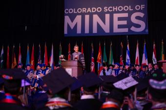 PCJ on stage during Spring 2019 commencement