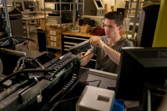 Connor McLean works in the Advanced Manufacturing lab