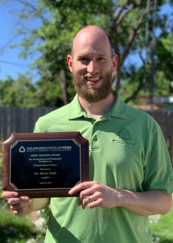 Kevin Cash with award plaque