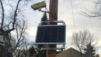 Camera attached to solar panel