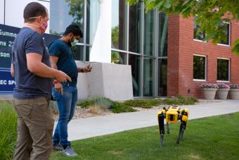 Mines students work with Spot the robot dog