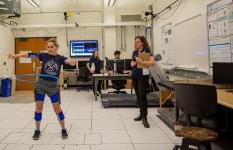 Anne Silverman watches a student in her biomechanics lab