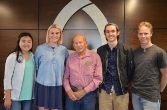 Don Thorson, center, with four students