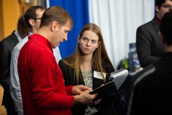 Mines student talks to a recruiter at Career Days