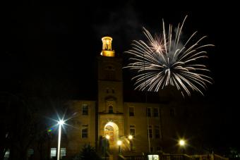 Fireworks explode behind Guggenheim Hall