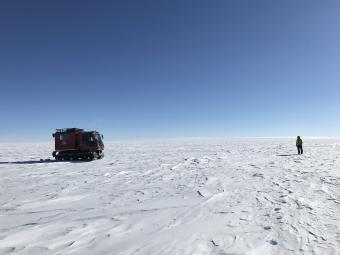 NASA researchers on the surface of the Antarctic Ice Sheet as part of the 88-South Traverse in 2019.
