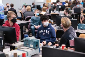 Students work together in Physics Studio class