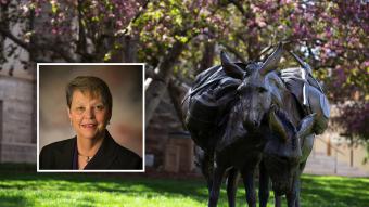 Barb Filas with Lean on Me statue