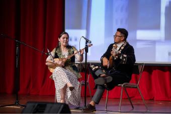 Students play an instrument at I Day