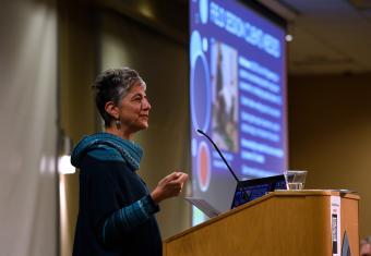 Iris Bahar speaks at podium