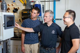 Chris Bellona with students in a PFAS lab at Mines