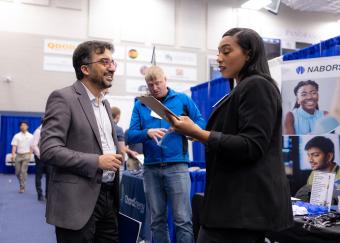 PhD student meets with a recruiter during Career days