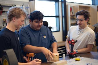 Philip McCuen, Angel Rocha and Jo Hearn works in the Cornerstone Lab