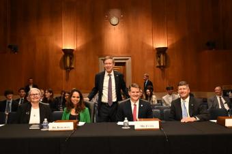 Sen. Hickenlooper with Bill Zisch and other witnesses at Senate committee hearing