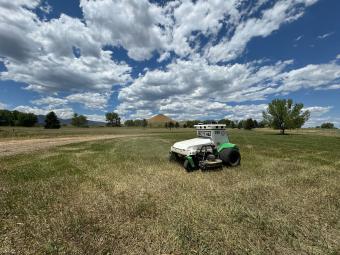 Scythe Robotics mower in a lawn