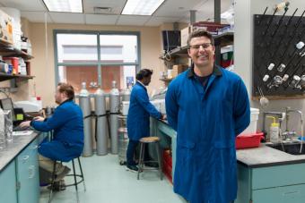 Mike McGuirk in the lab with students