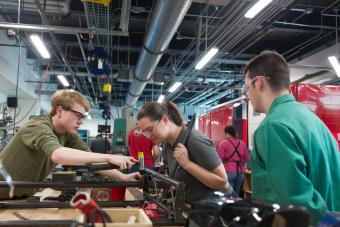 three students work in makerspace inside the Labriola Innovation Hubat Colorado School of Mines