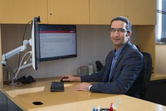 Pejman Tahmasebi at desk