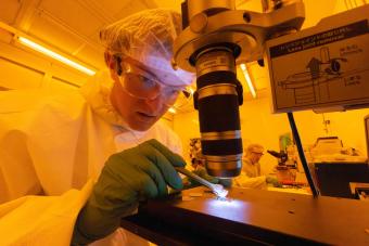 student works in nanofabrication clean room