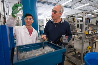 Louis Miyasaki and Professor Tzahi Cath work with the electrocoagulation pilot system in the Center for a Sustainable WE2ST at Mines. 