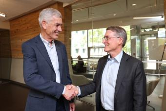 paul johnson and jud virden shake hands