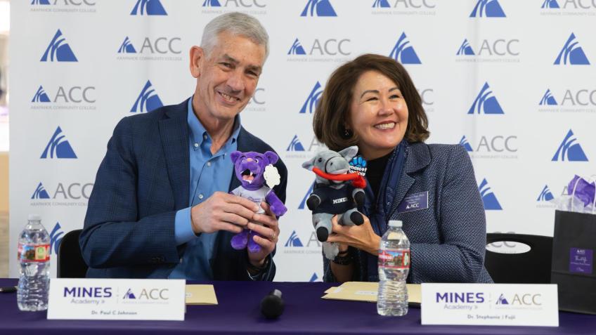 Mines President swaps mascot plushies with ACC president