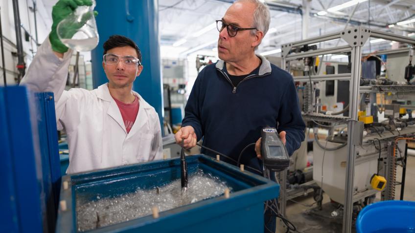 Louis Miyasaki and Professor Tzahi Cath work with the electrocoagulation pilot system in the Center for a Sustainable WE2ST at Mines. 