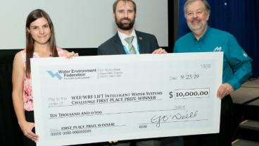 Kate Newhart with the winning team of the Intelligent Water Systems Challenge