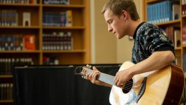 Mitch Cutts playing at the library