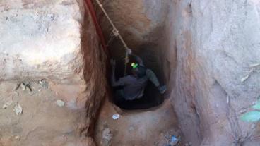 A young cobalt miner in Kolwezi, Democratic Republic of the Congo, clambers up a mineshaft. (Photo courtesy of University of Sussex)