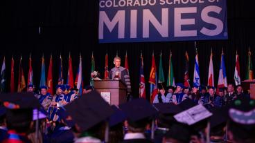 PCJ on stage during Spring 2019 commencement 