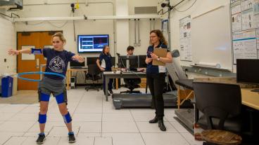 Anne Silverman watches a student in her biomechanics lab