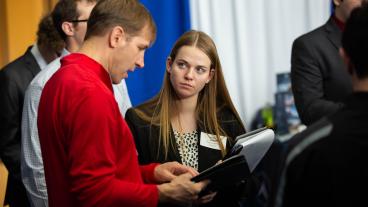 Mines student talks to a recruiter at Career Days