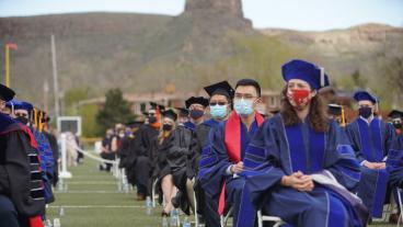 Graduates on Marv Kay Field during Spring 2021 Graduate Commencement