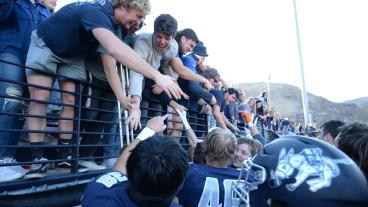 Fans interact with Orediggers after win