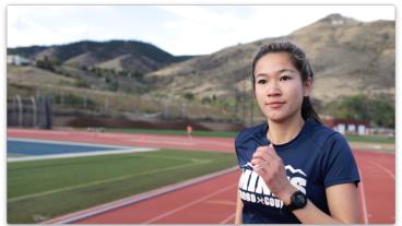 Zoe Baker runs on the track at Mines