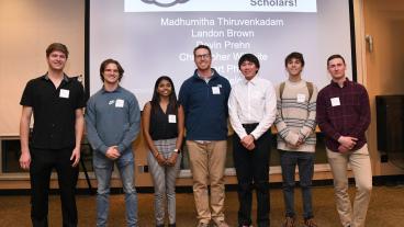 Student scholarship recipients pose for photo