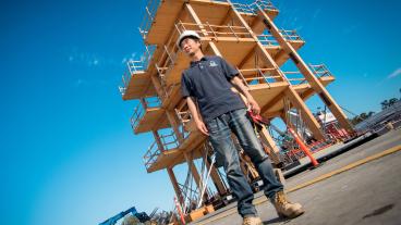 Shiling Pei in front of the tallwood building under construction