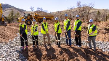 Mines officials with ceremonial shovels