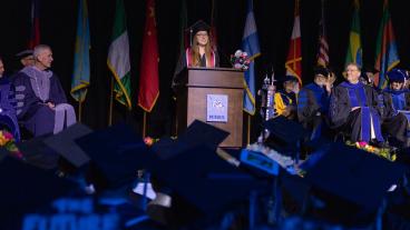 Female student speaks at commencement 