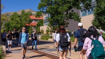 Students walk on campus during passing period