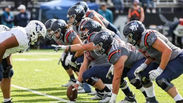 Mines Football in action against South Dakota Mines